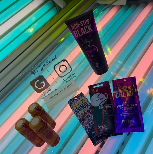 Tanning products and Radiant's printed Google review card on a sunbed